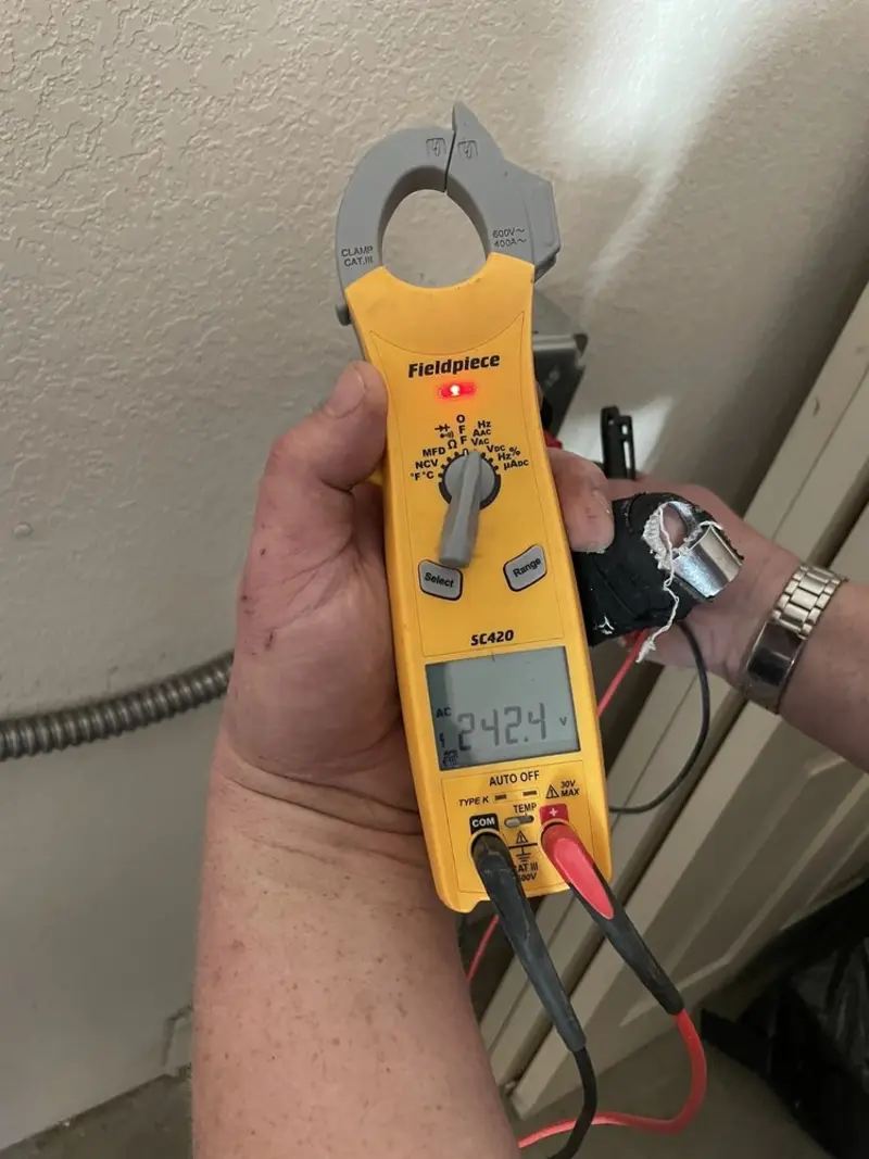 Voltage testing with clamp meter during Aluminum Wiring Replacement in Brockport